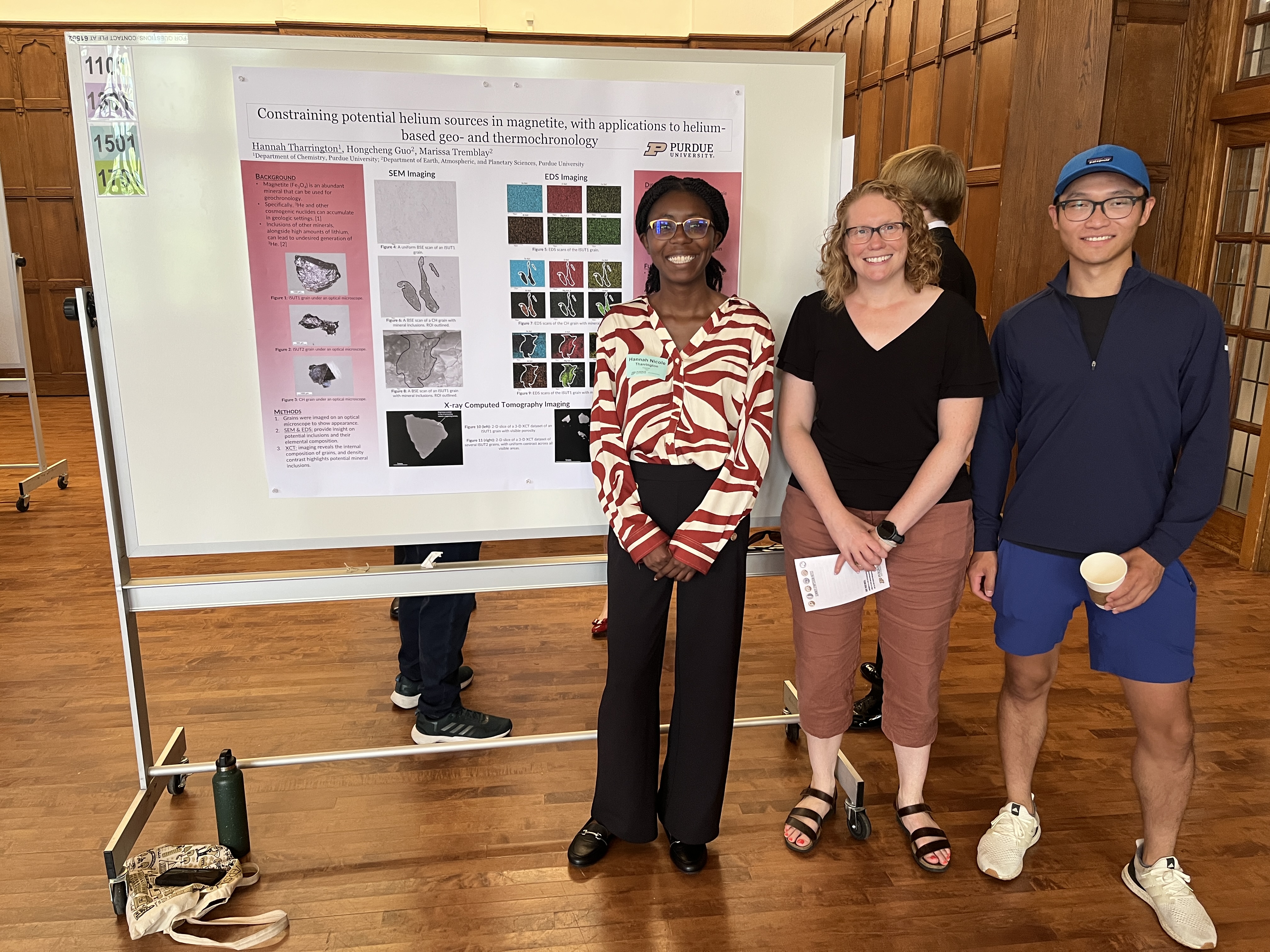 photo of Hannah, Marissa, and Hongcheng at Hannah's poster